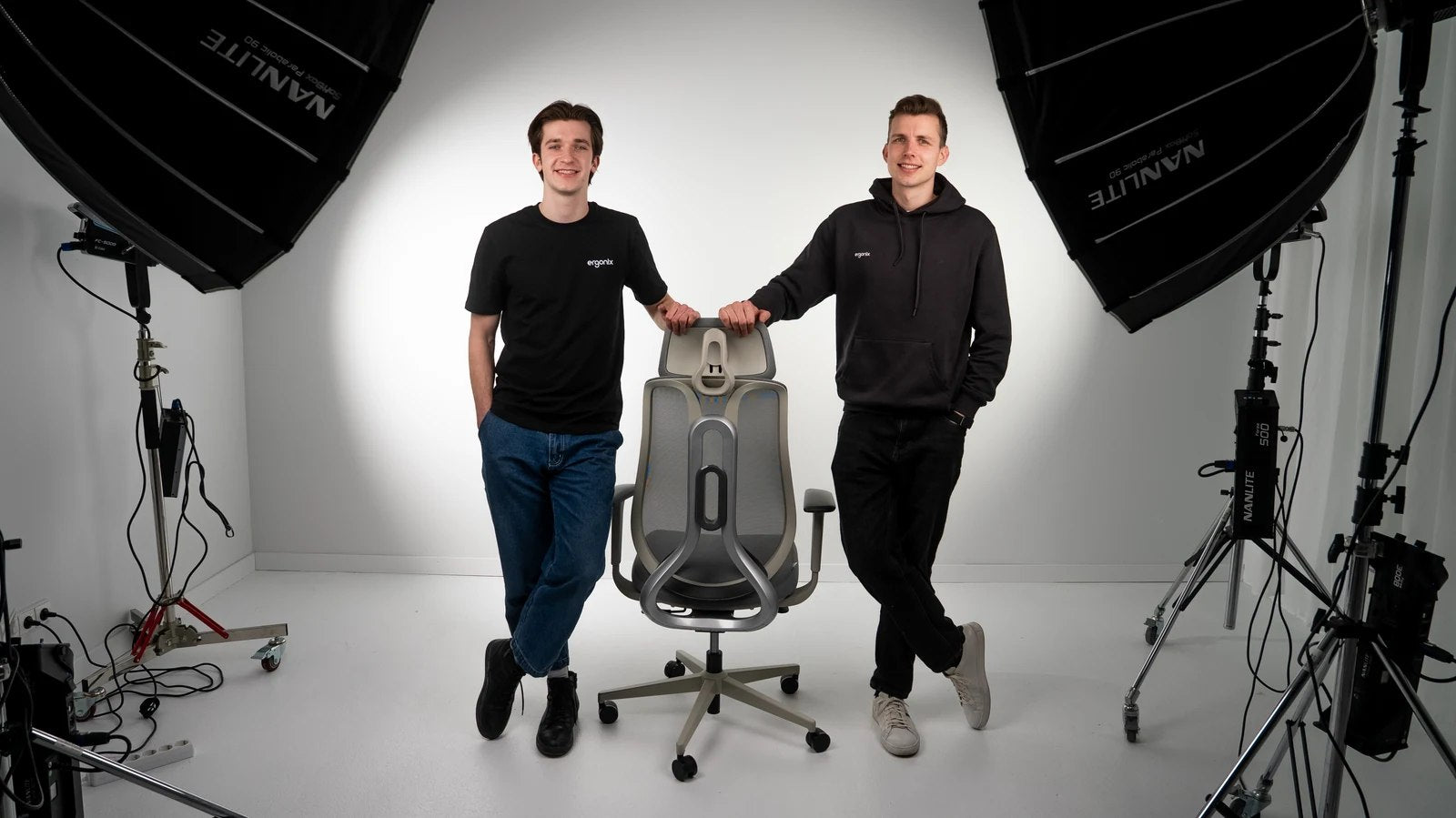 Gustas and Lukas in the studio with the Ergonix chair where it all started